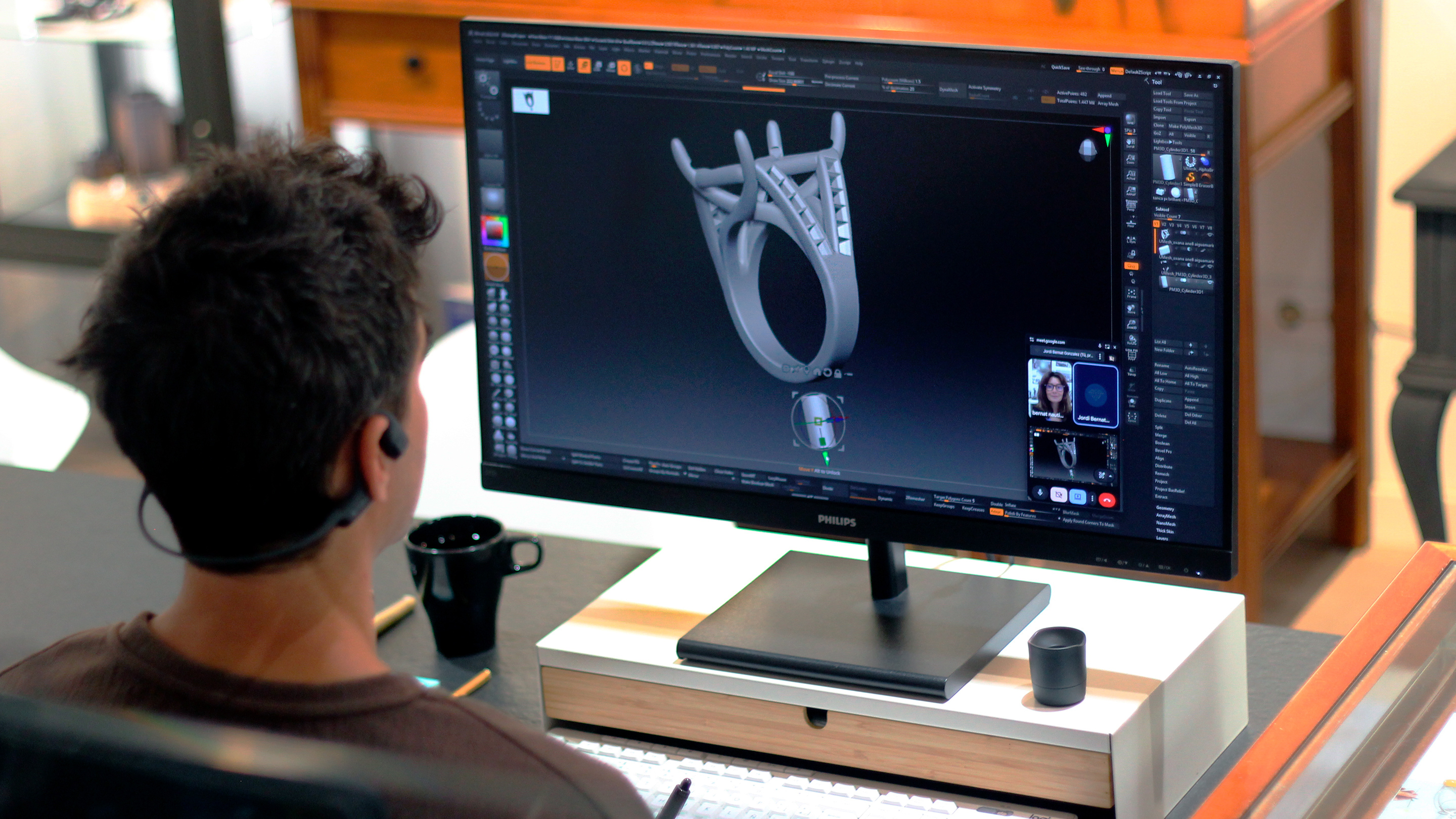 Google Meet call with ZBrush shared on screen, modelling a jewellery piece in real time